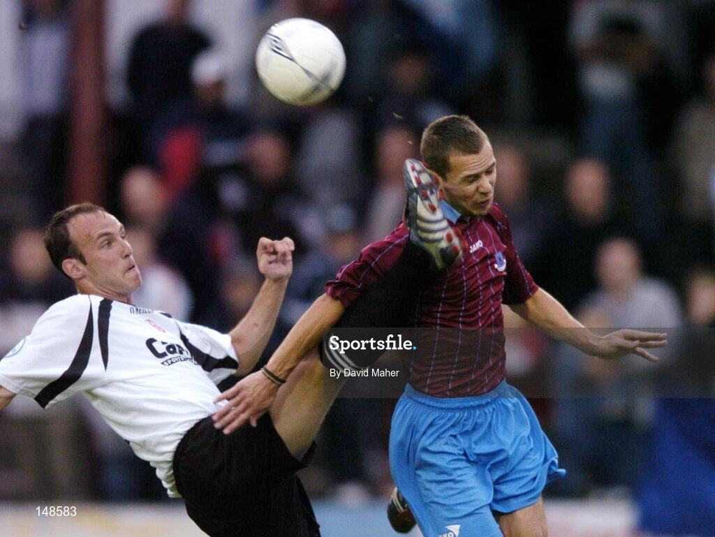 26 July 2004; Paul Marney, Dundalk, in action against Declan O'Brien, Drogheda United. FAI Carlsberg Cup, Second Round Replay, Drogheda United v Dundalk, United Park, Drogheda, Co. Louth. Picture credit; David Maher / SPORTSFILE