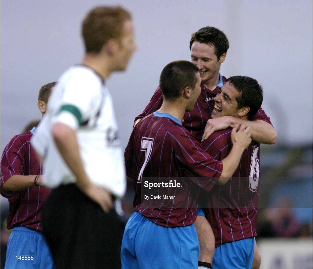 26 July 2004; John Lester, far right, Drogheda United, celebrates after scoring his sides second goal with team-mates, Gavin Whelan, no.7 and Barry Molloy, as Dundalk's Stephen McGuinness watches on. FAI Carlsberg Cup, Second Round Replay, Drogheda United v Dundalk, United Park, Drogheda, Co. Louth. Picture credit; David Maher / SPORTSFILE