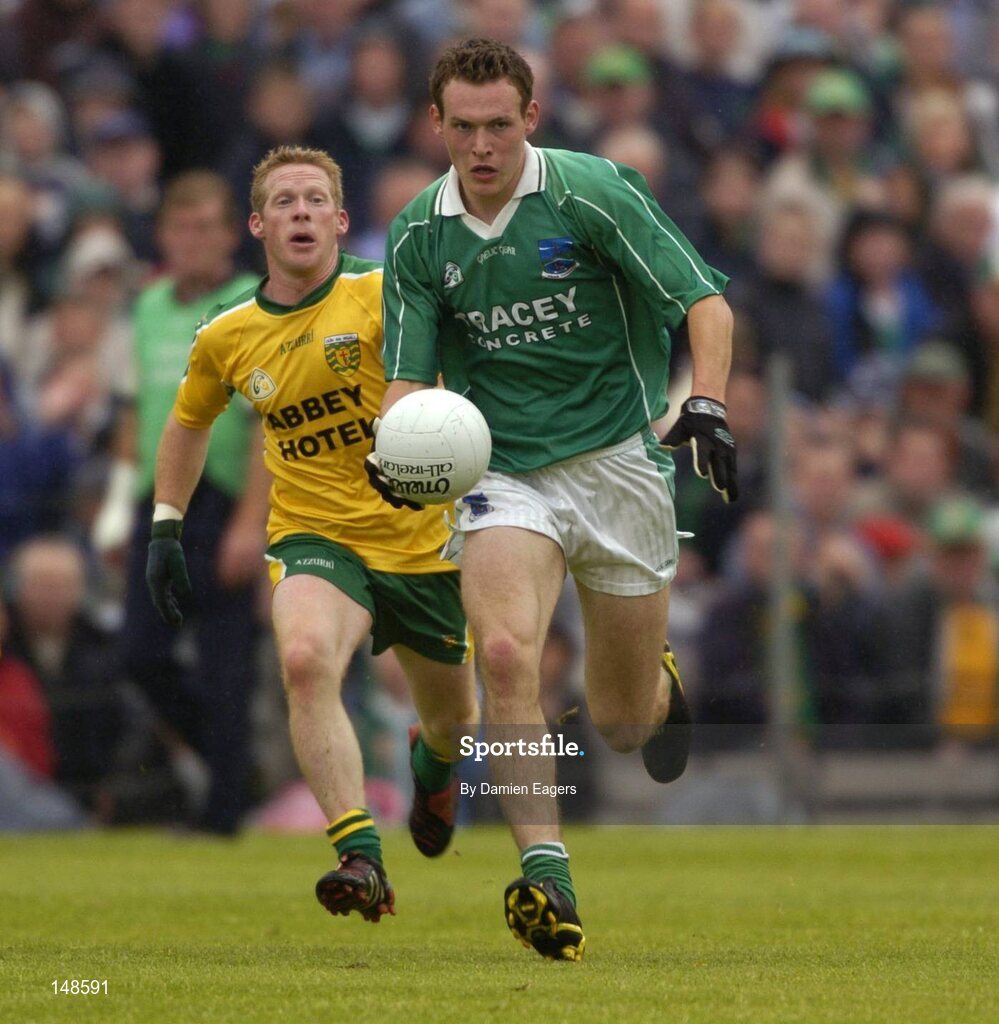 24 July 2004; James Sherry, Fermanagh, in action against Donegal's Brian Roper. Bank of Ireland Senior Football Championship Qualifier, Round 4, Fermanagh v Donegal, Tighernach's Park, Clones. Co. Monaghan. Picture credit; Damien Eagers / SPORTSFILE