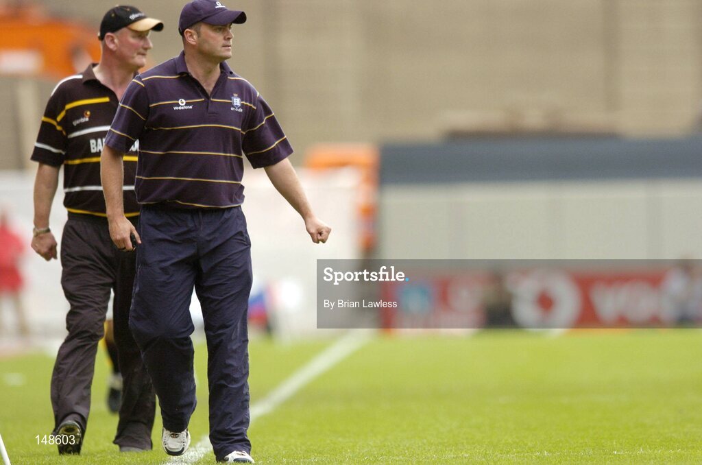 25 July 2004; Clare manager Anthony Daly and Kilkenny manager Brian Cody, left, pictured during the game. Guinness All-Ireland Senior Hurling Championship, Quarter Final, Clare v Kilkkenny, Croke Park, Dublin. Picture credit; Brian Lawless / SPORTSFILE