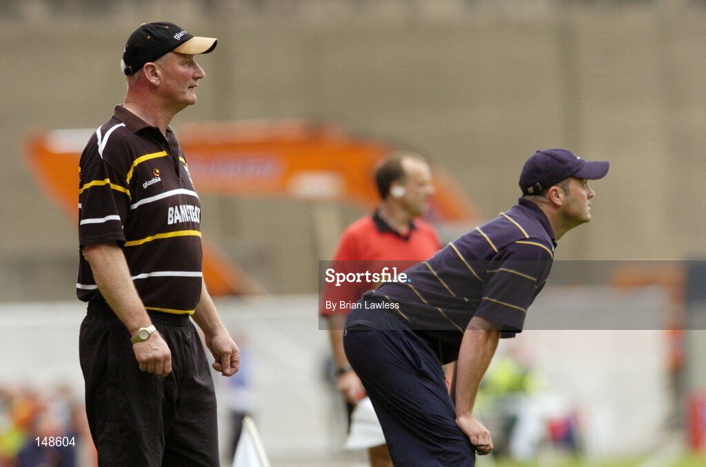 25 July 2004; Kilkenny manager Brian Cody, left, and Clare managerAnthony Daly pictured during during the game. Guinness All-Ireland Senior Hurling Championship, Quarter Final, Clare v Kilkkenny, Croke Park, Dublin. Picture credit; Brian Lawless / SPORTSFILE
