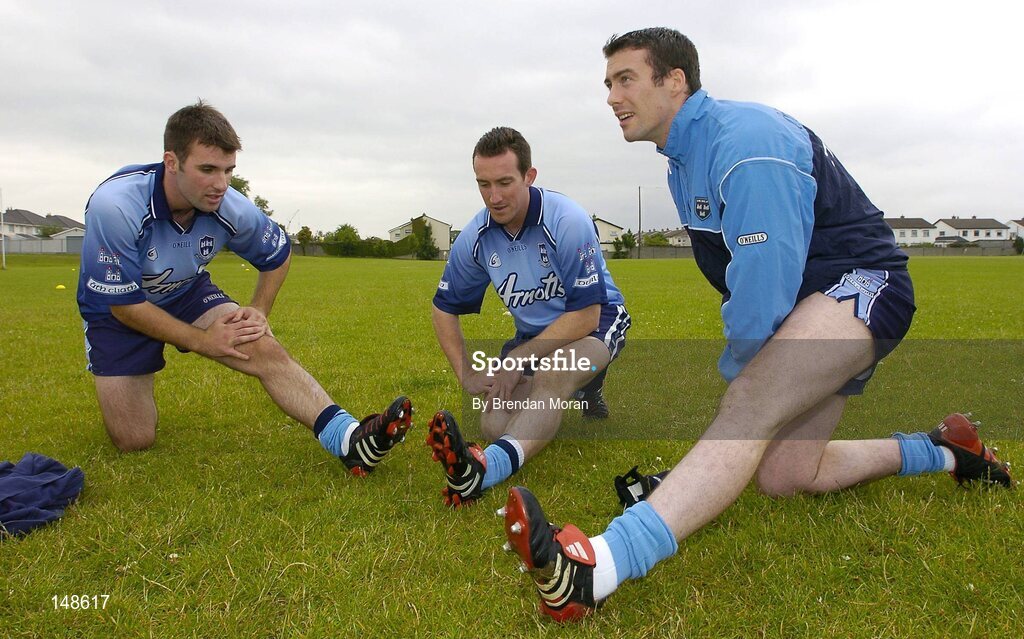 26 July 2004; The Dubs will be relying on the new technology in their adidas Predator Pulse boots to give them the edge over Roscommon, in the next stage of the All-Ireland Football Championship qualifiers on Saturday 31st July at Croke Park. Pictured with the boots during a squad training session ahead of next weekend's game are, from left, Bryan Cullen, Paddy Christie and Ray Cosgrove. Picture credit; Brendan Moran / SPORTSFILE