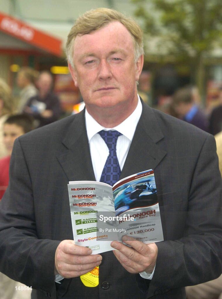 27 July 2004; John O'Donoghue, Minister for Arts, Tourism and Sport, enjoys a day at the Galway Races. Albatros Feeds Maiden Hurdle. Galway Races, Ballybrit, Co. Galway. Picture credit; Pat Murphy / SPORTSFILE