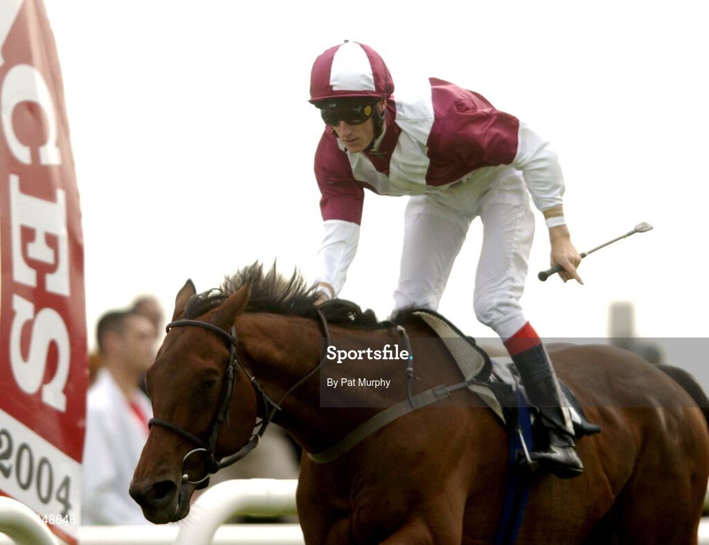 27 July 2004; Loyal, with Fran Berry up, crosses the finish line to win the McDonagh Builders Trade Centre Handicap. Galway Races, Ballybrit, Co. Galway. Picture credit; Pat Murphy / SPORTSFILE