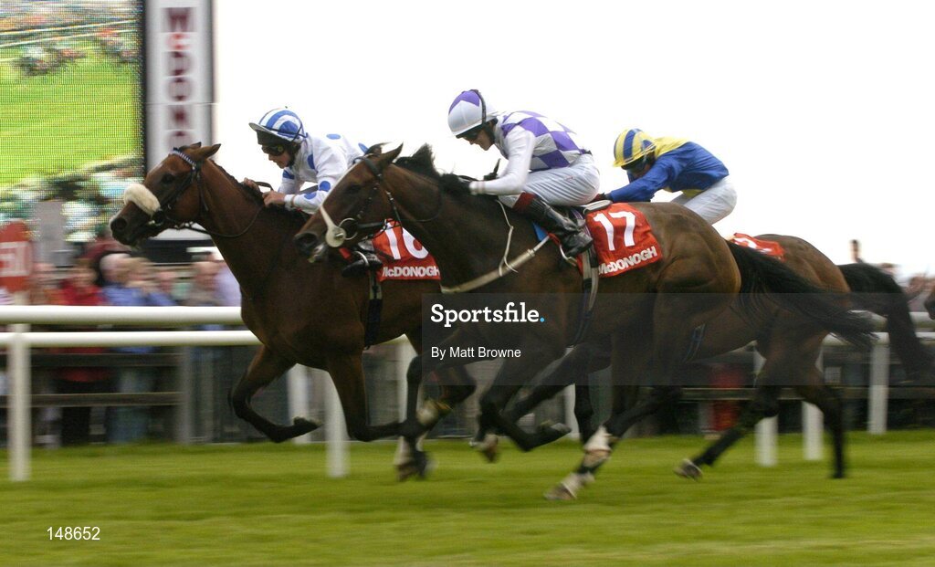27 July 2004; Palace Star, 16, with Rory Cleary up, on the way to winning the McDonagh EBF Handicap from second place Amourallis, 17, with Padraig Beggy. Galway Races, Ballybrit, Co. Galway. Picture credit; Matt Browne / SPORTSFILE
