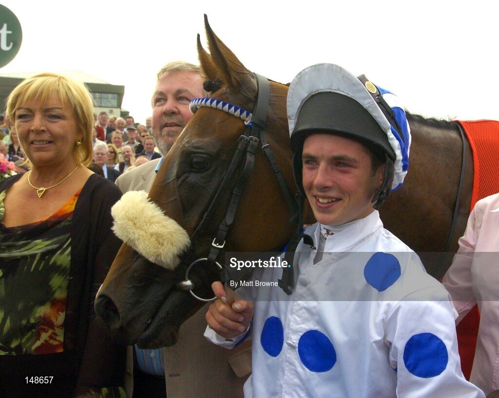 27 July 2004; Rory Cleary pictured with Palace Star and the winning connectios after their victory in the McDonagh EBF Handicap. Galway Races, Ballybrit, Co. Galay. Picture credit; Matt Browne / SPORTSFILE