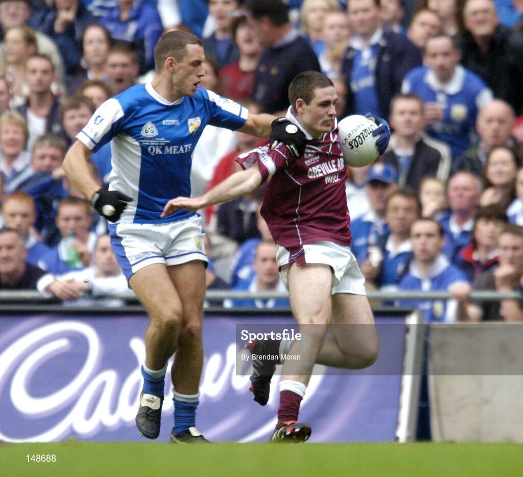 24 July 2004; Fergal Wilson, Westmeath, in action against Darren Rooney, Laois. Bank of Ireland Leinster Senior Football Championship Final Replay, Westmeath v Laois, Croke Park, Dublin. Picture credit; Brendan Moran / SPORTSFILE
