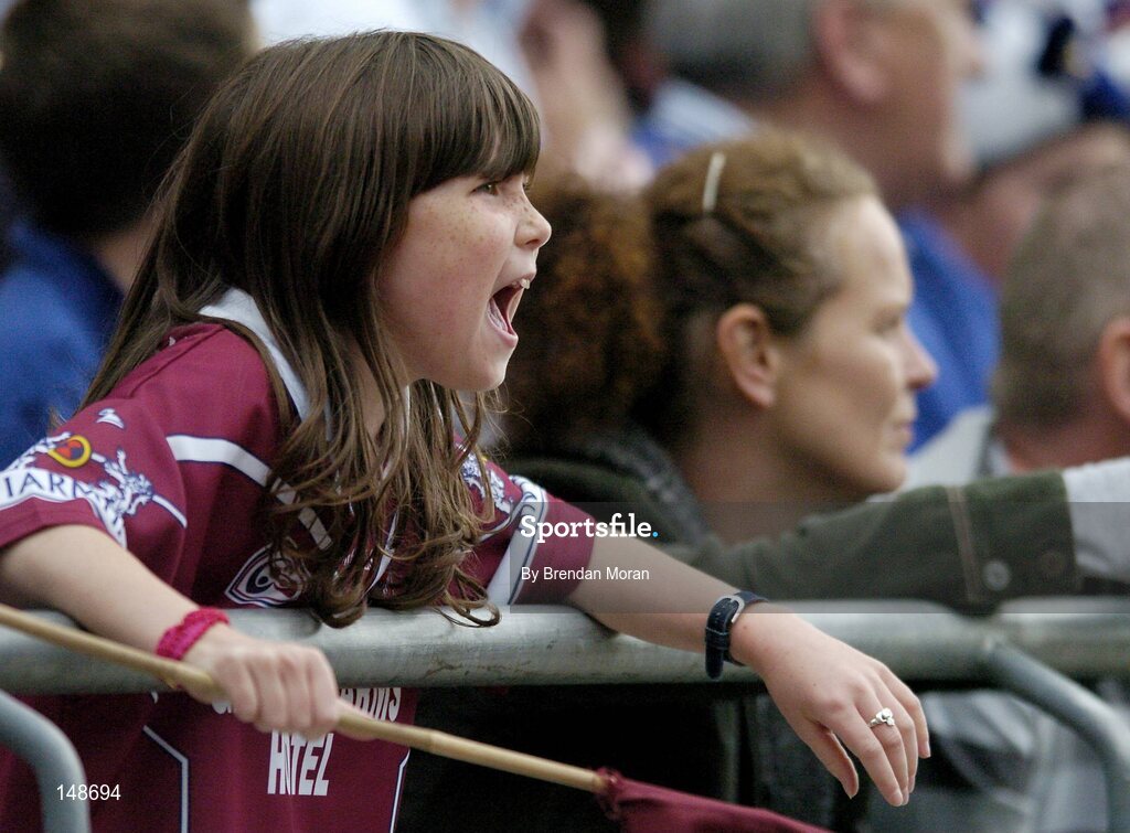 24 July 2004; A Westmeath fan cheers on her side. Bank of Ireland Leinster Senior Football Championship Final Replay, Westmeath v Laois, Croke Park, Dublin. Picture credit; Brendan Moran / SPORTSFILE