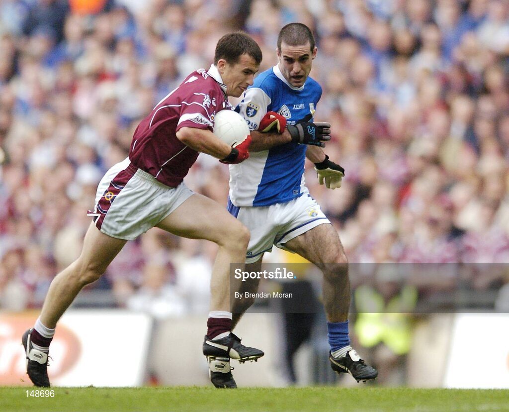 24 July 2004; Dessie Dolan, Westmeath, in action against Aidan Fennelly, Laois. Bank of Ireland Leinster Senior Football Championship Final Replay, Westmeath v Laois, Croke Park, Dublin. Picture credit; Brendan Moran / SPORTSFILE