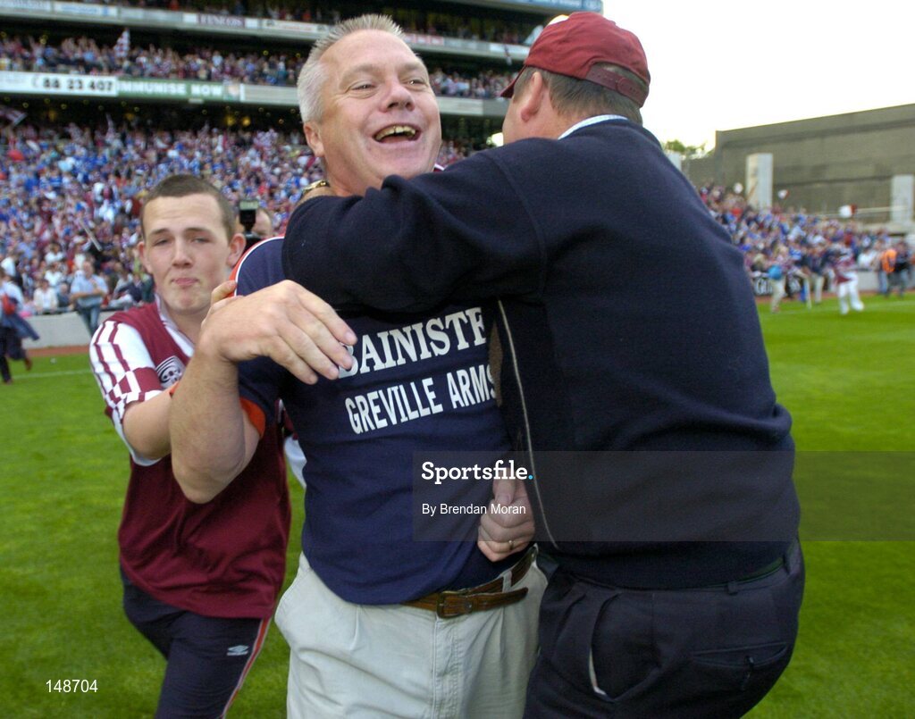 24 July 2004; Westmeath manager Paidi O Se is congratulated by fans after victory over Laois. Bank of Ireland Leinster Senior Football Championship Final Replay, Westmeath v Laois, Croke Park, Dublin. Picture credit; Brendan Moran / SPORTSFILE
