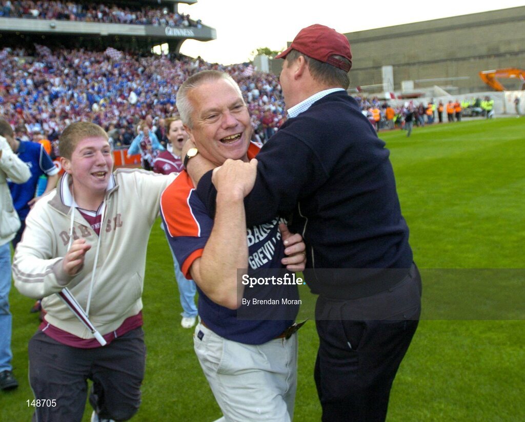 24 July 2004; Westmeath manager Paidi O Se is congratulated by fans after victory over Laois. Bank of Ireland Leinster Senior Football Championship Final Replay, Westmeath v Laois, Croke Park, Dublin. Picture credit; Brendan Moran / SPORTSFILE