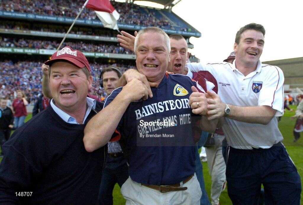24 July 2004; Westmeath manager Paidi O Se attempts to fight off celebrating fans after victory over Laois. Bank of Ireland Leinster Senior Football Championship Final Replay, Westmeath v Laois, Croke Park, Dublin. Picture credit; Brendan Moran / SPORTSFILE