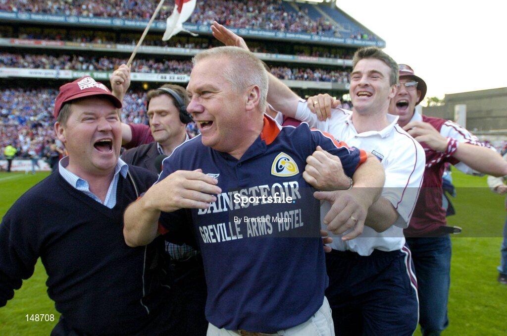 24 July 2004; Westmeath manager Paidi O Se is congratulated by fans after victory over Laois. Bank of Ireland Leinster Senior Football Championship Final Replay, Westmeath v Laois, Croke Park, Dublin. Picture credit; Brendan Moran / SPORTSFILE