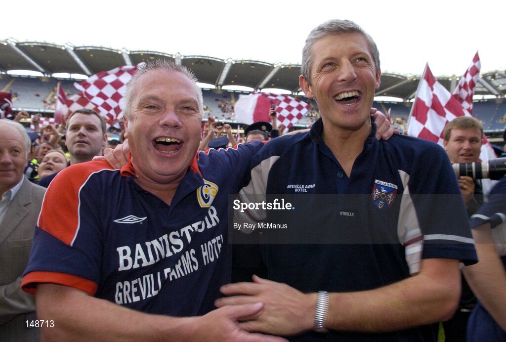 24 July 2004; Westmeath manager Paidi O Se, left, and selector Tomas O Flatharta celebrate victory over Laois. Bank of Ireland Leinster Senior Football Championship Final Replay, Westmeath v Laois, Croke Park, Dublin. Picture credit; Ray McManus / SPORTSFILE