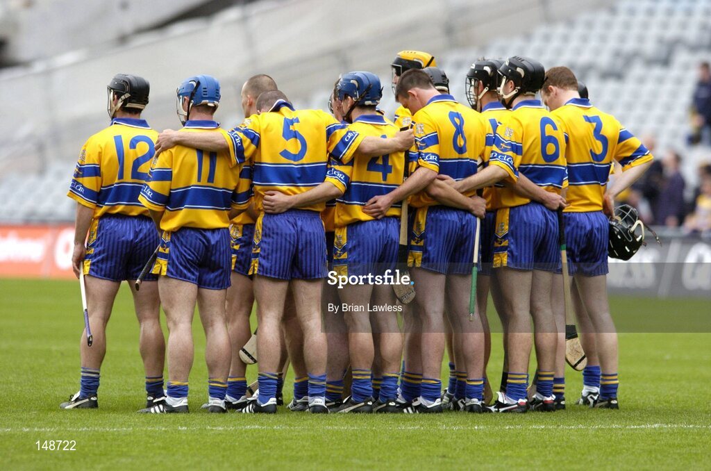 25 July 2004; The Clare team stand for a minute silence before the game. Guinness All-Ireland Senior Hurling Championship, Quarter Final, Clare v Kilkkenny, Croke Park, Dublin. Picture credit; Brian Lawless / SPORTSFILE