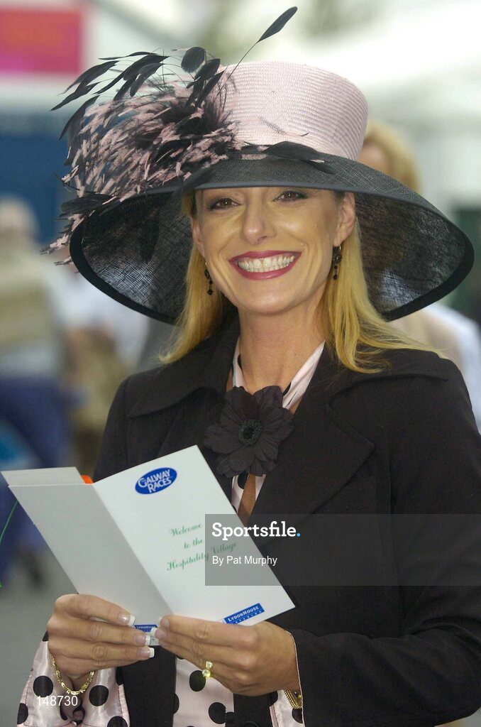 28 July 2004; Kelly Ricucci, from California, USA, enjoys a day out at the Galway Races. Galway Races, Ballybrit, Co. Galway. Picture credit; Pat Murphy / SPORTSFILE