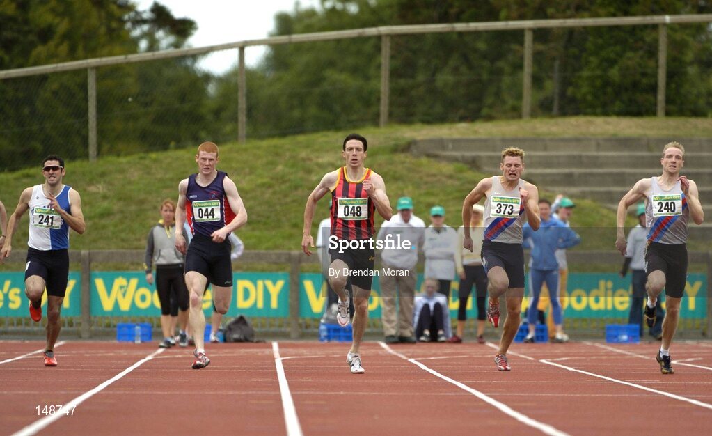 25 July 2004; Tomas Coman (048), Moycarkey Coolcroo AC, leads, Gordon Kennedy (241), Tullamore Harriers, David McCarthy (044), Le Cheile AC, David Gillick (373), Dundrum South Dublin and Robert Daly (240), Dundrum South Dublin, on his way to winning the Men's 400m Final. AAI Senior Track and Field Championships, Morton Stadium, Santry, Dublin. Picture credit; Brendan Moran / SPORTSFILE