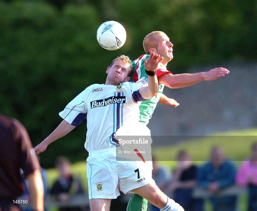 28 July 2004; Patrick Sullivan, UCD, in action against John O'Flynn, Cork City. FAI Cup Replay, UCD v Cork City, Belfield Park, UCD, Dublin. Picture credit; Brian Lawless / SPORTSFILE