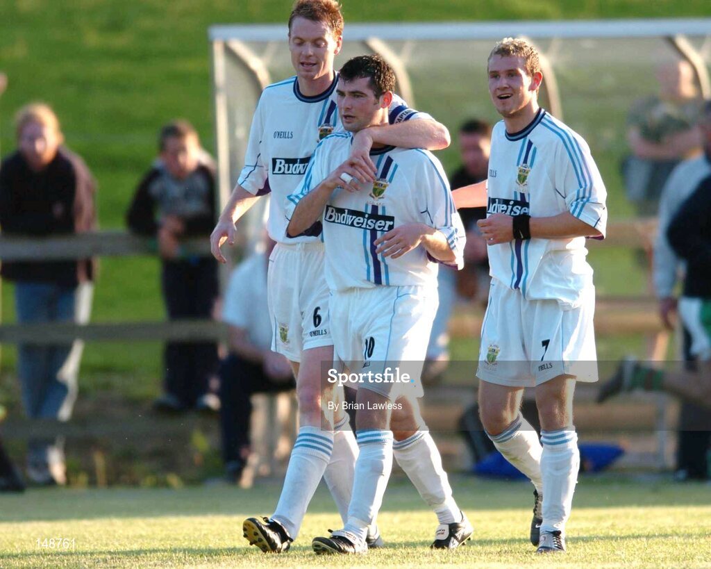 28 July 2004; UCD's Sean Finn (10) celebrates with team-mates Tony McDonnell, left, and Patrick Sullivan after scoring a goal for his side. FAI Cup Replay, UCD v Cork City, Belfield Park, UCD, Dublin. Picture credit; Brian Lawless / SPORTSFILE