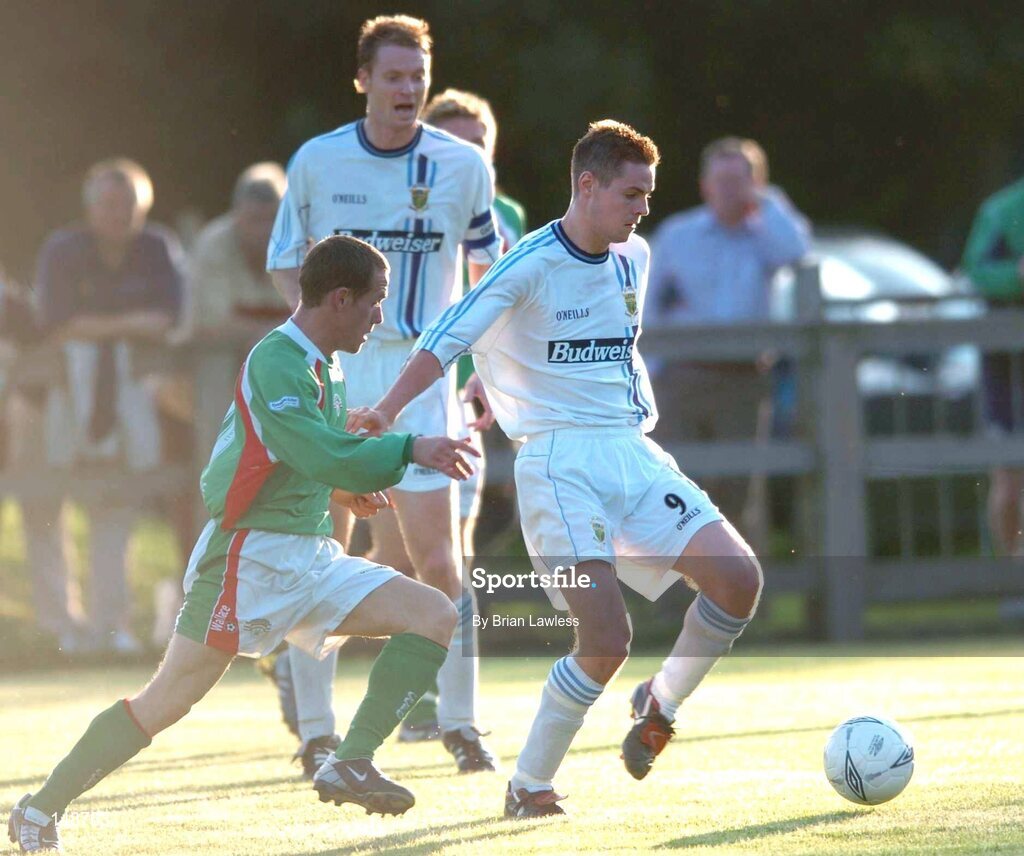 28 July 2004; Robbie Martin, UCD, in action against Joe Gamble, Cork City. FAI Cup Replay, UCD v Cork City, Belfield Park, UCD, Dublin. Picture credit; Brian Lawless / SPORTSFILE