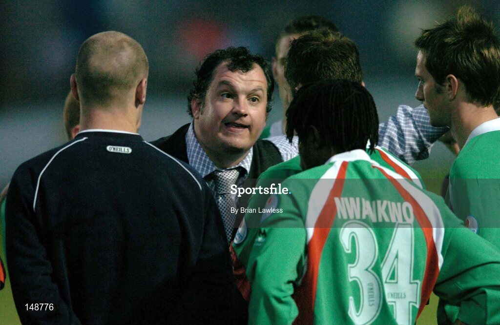 28 July 2004; Cork City manager Pat Dolan speaks to his players after the match. FAI Cup Replay, UCD v Cork City, Belfield Park, UCD, Dublin. Picture credit; Brian Lawless / SPORTSFILE