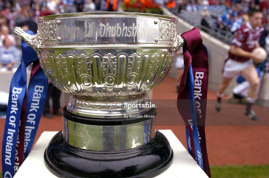 24 July 2004; The Westmeath team runs out onto the pitch behind the Corn Ui Dhubhshlaine Leinster Championship trophy. Bank of Ireland Leinster Senior Football Championship Final Replay, Westmeath v Laois, Croke Park, Dublin. Picture credit; Brendan Moran / SPORTSFILE