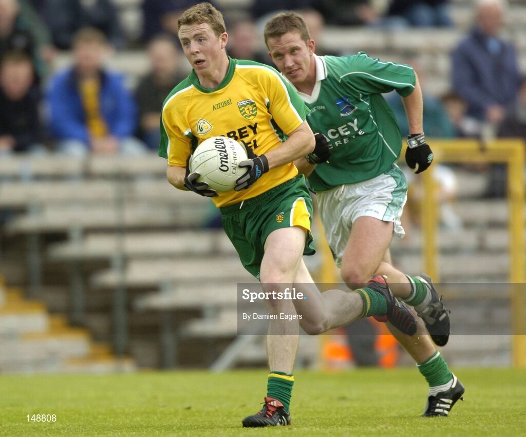 24 July 2004; Stephen McDermott, Donegal, in action against Fermanagh's Shane McDermott. Bank of Ireland Senior Football Championship Qualifier, Round 4, Fermanagh v Donegal, Tighernach's Park, Clones. Co. Monaghan. Picture credit; Damien Eagers / SPORTSFILE