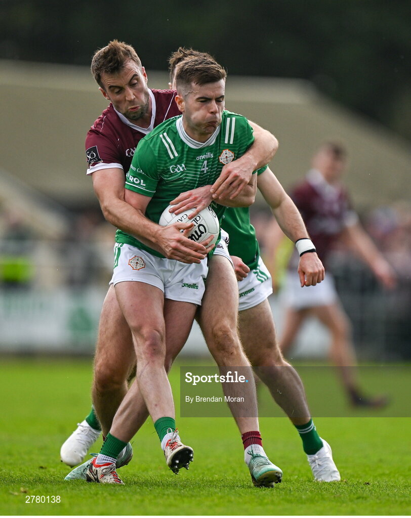 6 April 2024; Fiontan Eastwood of London is tackled by Paul Conroy of Galway during the Connacht GAA Football Senior Championship quarter-final match between London and Galway at McGovern Park in Ruislip, England. Photo by Brendan Moran/Sportsfile