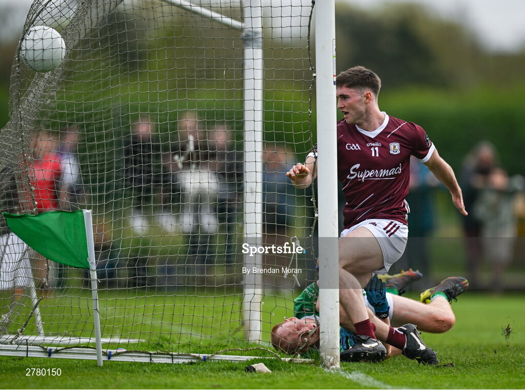 6 April 2024; Cathal Sweeney of Galway scores his side's first goal despite the efforts of Stephen Dornan of London during the Connacht GAA Football Senior Championship quarter-final match between London and Galway at McGovern Park in Ruislip, England. Photo by Brendan Moran/Sportsfile