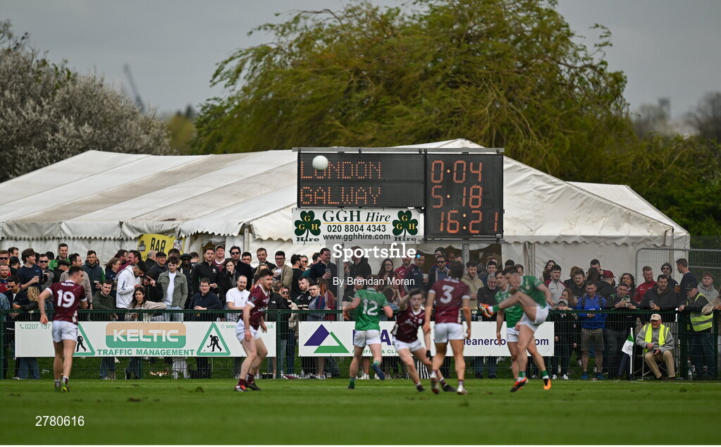 6 April 2024; The scoreboard during the second half as Shay Rafter of London kicks his side's fifth point during the Connacht GAA Football Senior Championship quarter-final match between London and Galway at McGovern Park in Ruislip, England. Photo by Brendan Moran/Sportsfile