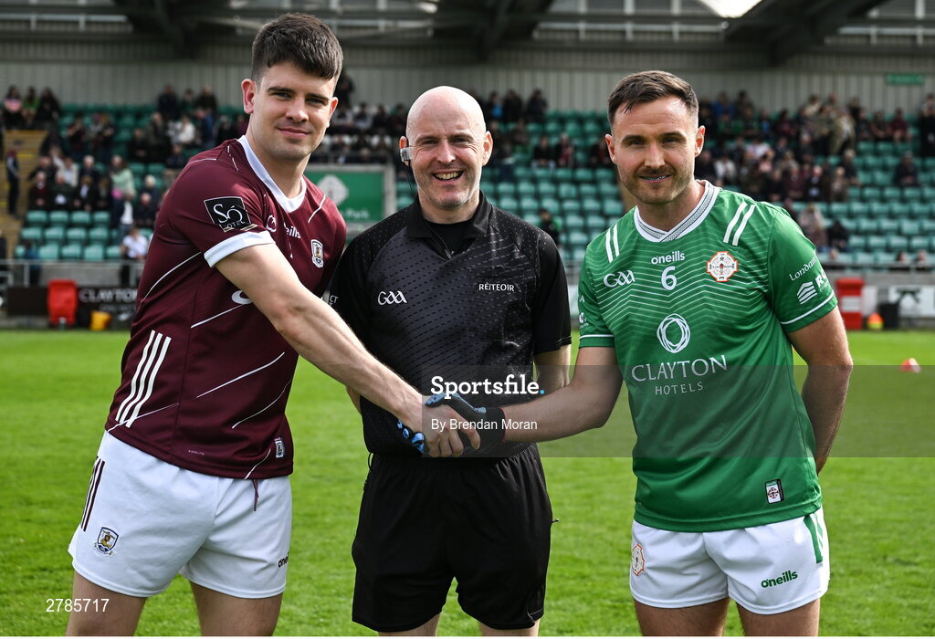 6 April 2024; Team captains Sean Kelly of Galway, left, and Eoin Walsh of London, both from Moycullen in Galway, shake hands in the company of referee Liam Devenney before the Connacht GAA Football Senior Championship quarter-final match between London and Galway at McGovern Park in Ruislip, England. Photo by Brendan Moran/Sportsfile Photo by Brendan Moran/Sportsfile