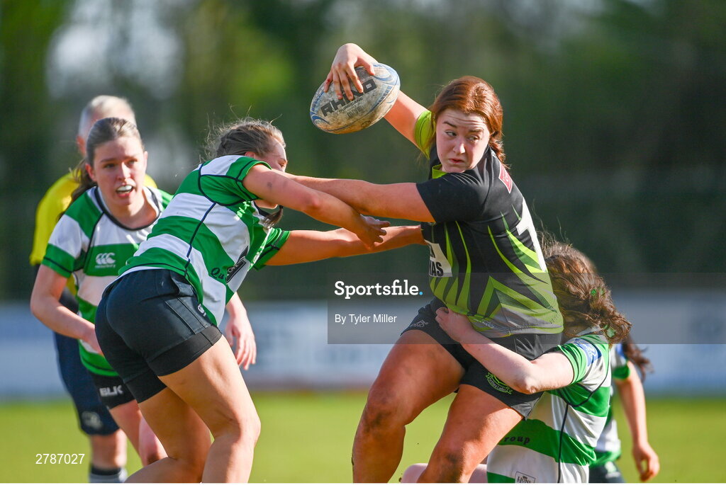 13 April 2024; Ali Bennett of Portdara is tackled by Saoirse Aherne, left, and Eabha Cullen of Naas during the Leinster Rugby Girl's U18 semi-final match between Naas and Portdara at Naas RFC in Kildare. Photo by Tyler Miller/Sportsfile