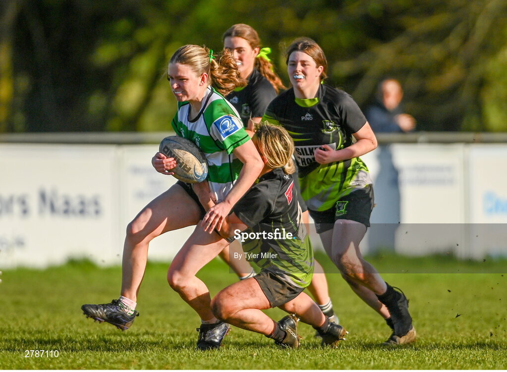 13 April 2024; Lily Haslam of Naas is tackled by Orla McDonald of Portdara during the Leinster Rugby Girl's U18 semi-final match between Naas and Portdara at Naas RFC in Kildare. Photo by Tyler Miller/Sportsfile