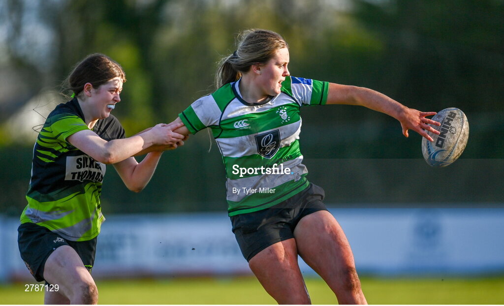 13 April 2024; Sophie Francis of Naas in action against Nicole Walsh of Portdara during the Leinster Rugby Girl's U18 semi-final match between Naas and Portdara at Naas RFC in Kildare. Photo by Tyler Miller/Sportsfile