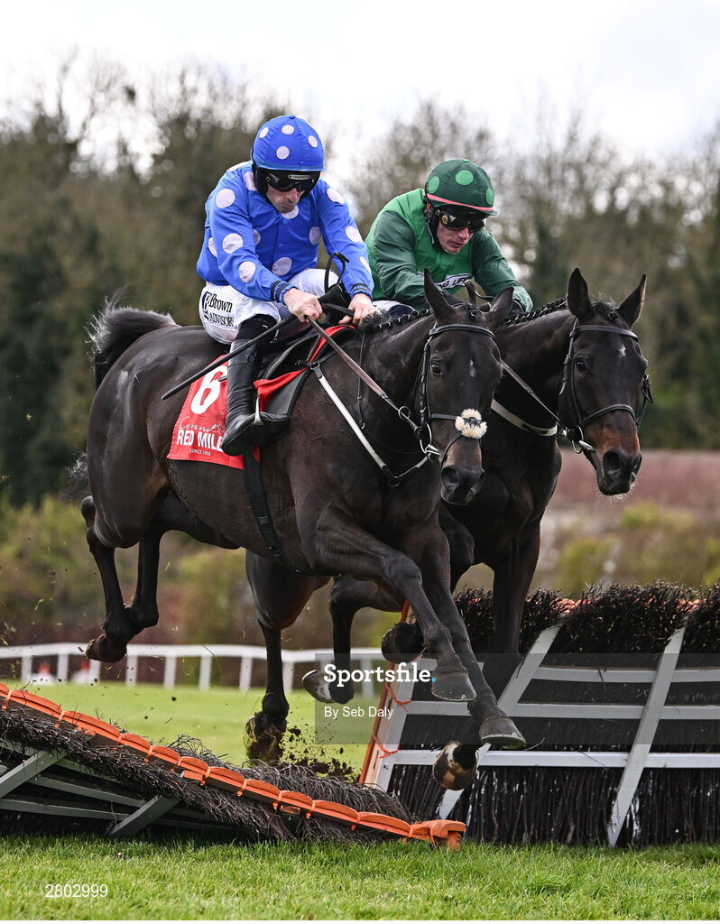 1 May 2024; Backtonormal, left, with Sean Flanagan up, jumps the last on their way to winning the Connolly's RED MILLS Irish EBF Auction Hurdle Series Final, from eventual fourth place Blizzard Of Oz, right, with Paul Townend up, during day two of the Punchestown Festival at Punchestown Racecourse in Kildare. Photo by Seb Daly/Sportsfile