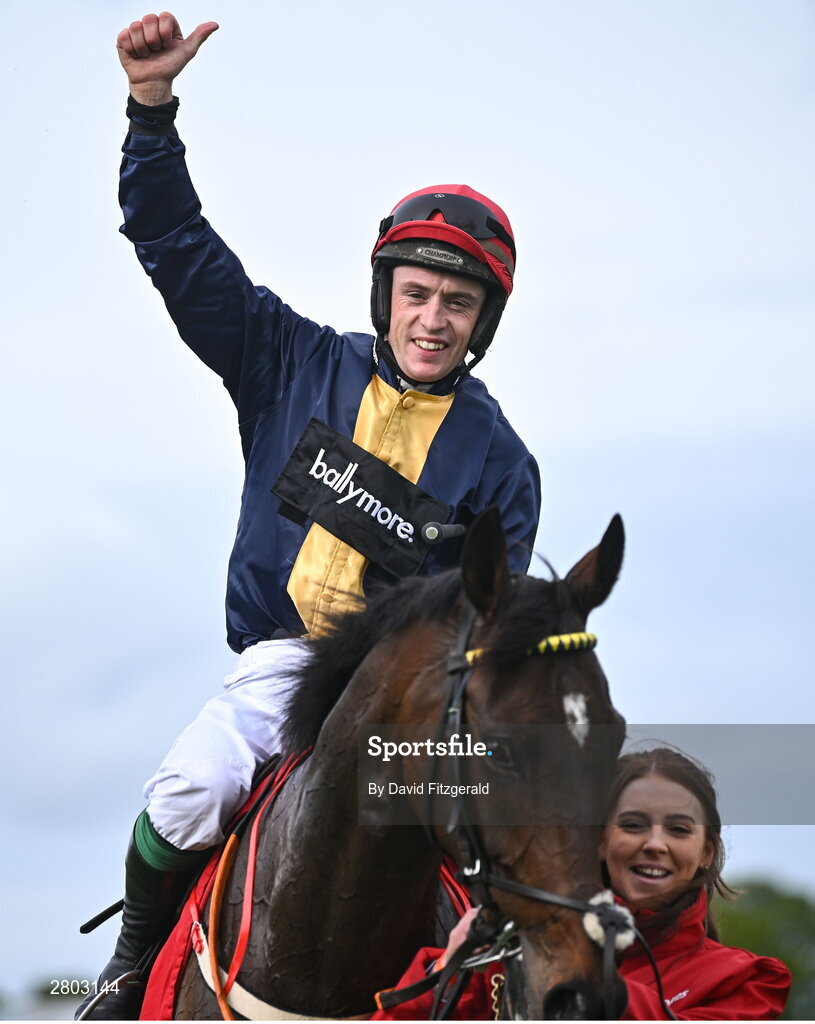 1 May 2024; JJ Slevin celebrates on Fastorslow with groom Therese Sweeney after winning the Ladbrokes Punchestown Gold Cup during day two of the Punchestown Festival at Punchestown Racecourse in Kildare. Photo by David Fitzgerald/Sportsfile
