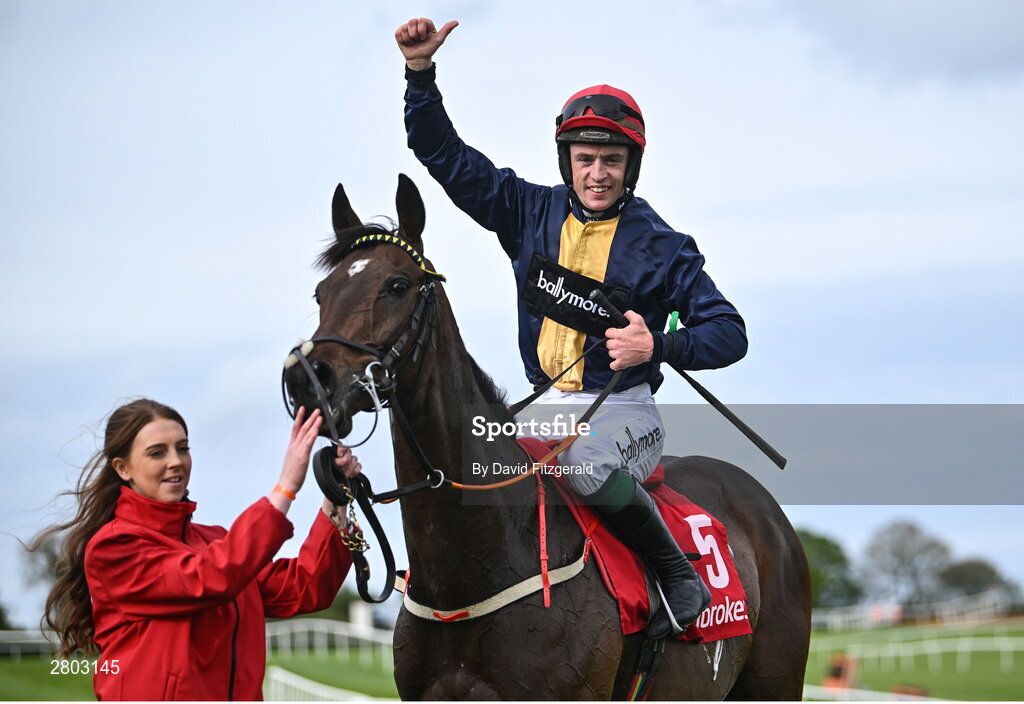 1 May 2024; JJ Slevin celebrates on Fastorslow with groom Therese Sweeney after winning the Ladbrokes Punchestown Gold Cup during day two of the Punchestown Festival at Punchestown Racecourse in Kildare. Photo by David Fitzgerald/Sportsfile