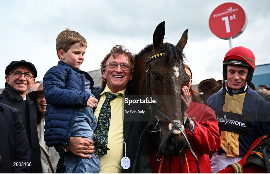 1 May 2024; Owner Sean Mulryan, centre, with his grandson Sean, trainer Martin Brassil, left, and jockey JJ Slevin, right, after sending out Fastorslow to win the Ladbrokes Punchestown Gold Cup during day two of the Punchestown Festival at Punchestown Racecourse in Kildare. Photo by Seb Daly/Sportsfile