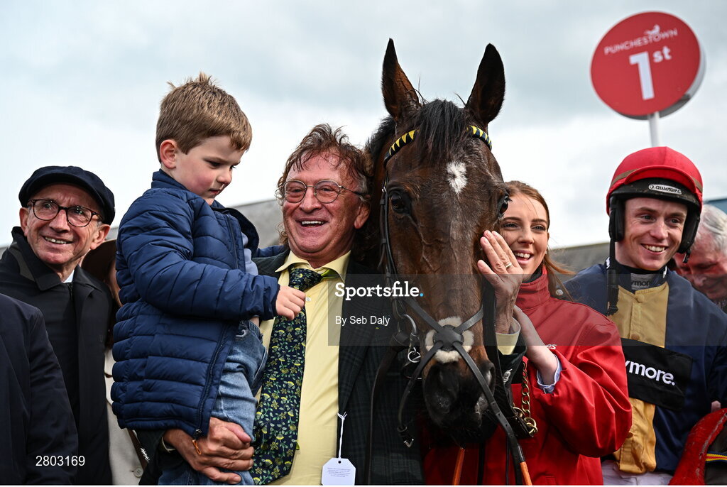 1 May 2024; Owner Sean Mulryan, centre, with his grandson Sean, trainer Martin Brassil, left, and jockey JJ Slevin, right, after sending out Fastorslow to win the Ladbrokes Punchestown Gold Cup during day two of the Punchestown Festival at Punchestown Racecourse in Kildare. Photo by Seb Daly/Sportsfile