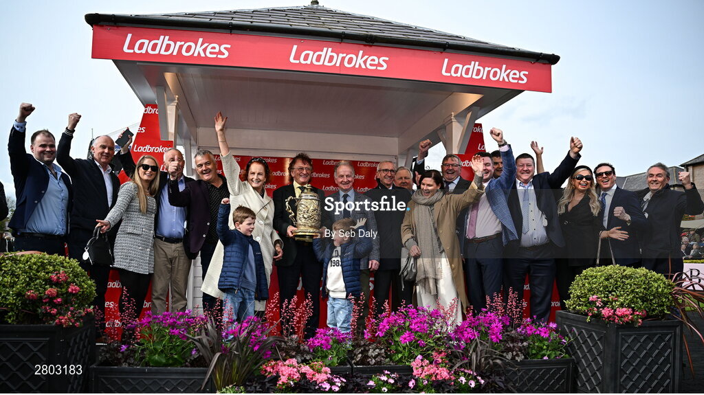 1 May 2024; Owner Sean Mulryan, centre, and winning connections of Fastorslow after winning the Ladbrokes Punchestown Gold Cup during day two of the Punchestown Festival at Punchestown Racecourse in Kildare. Photo by Seb Daly/Sportsfile