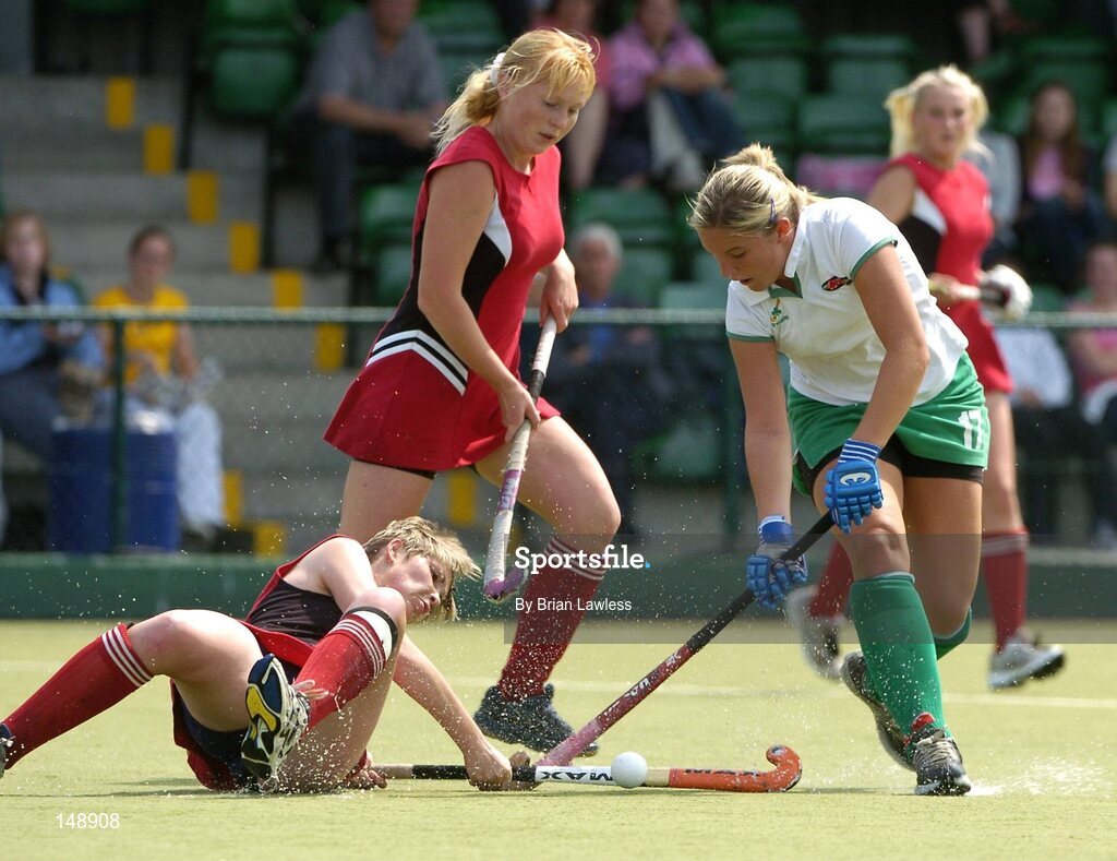 30 July 2004; Kirsty McCollum, Ireland, in action against Hanna Zabrotskaya, left, and Yulia Piatrova Belarus. European Hockey Junior Championship, Cross Over Match, Ireland v Belarus, UCD, Belfield, Dublin. Picture credit; Brian Lawless / SPORTSFILE