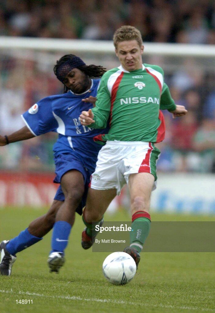 30 July 2004; Kevin Doyle, Cork City, in action against Waterford United's Jose Quitongio. eircom League Premier Division, Cork City v Waterford United, Turners Cross, Cork. Picture Credit; Matt Browne / SPORTSFILE