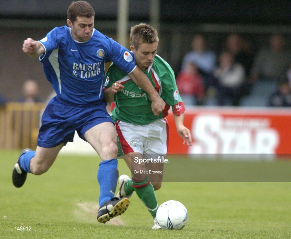 30 July 2004; David Mulcahy, Waterford United, in action against Cork City's Liam Kearney. eircom League Premier Division, Cork City v Waterford United, Turners Cross, Cork. Picture Credit; Matt Browne / SPORTSFILE