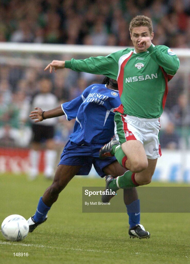 30 July 2004; Kevin Doyle, Cork City, in action against Waterford United's Jose Quitongio. eircom League Premier Division, Cork City v Waterford United, Turners Cross, Cork. Picture Credit; Matt Browne / SPORTSFILE