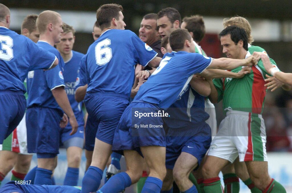 30 July 2004; Cork City and Waterford United players in a tussle at the start of the game. eircom League Premier Division, Cork City v Waterford United, Turners Cross, Cork. Picture Credit; Matt Browne / SPORTSFILE