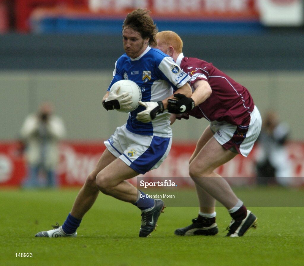 24 July 2004; Colm Parkinson, Laois, in action against Donal O'Donoghue, Westmeath. Bank of Ireland Leinster Senior Football Championship Final Replay, Westmeath v Laois, Croke Park, Dublin. Picture credit; Brendan Moran / SPORTSFILE