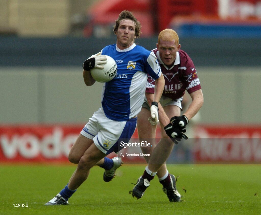 24 July 2004; Colm Parkinson, Laois, in action against Donal O'Donoghue, Westmeath. Bank of Ireland Leinster Senior Football Championship Final Replay, Westmeath v Laois, Croke Park, Dublin. Picture credit; Brendan Moran / SPORTSFILE