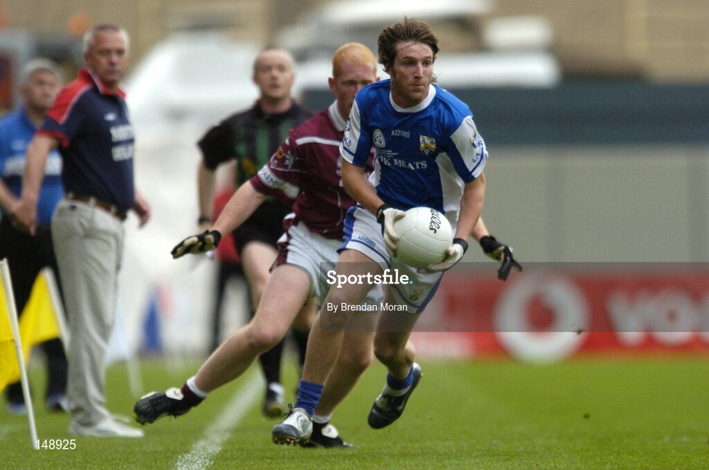 24 July 2004; Colm Parkinson, Laois, in action against Donal O'Donoghue, Westmeath. Bank of Ireland Leinster Senior Football Championship Final Replay, Westmeath v Laois, Croke Park, Dublin. Picture credit; Brendan Moran / SPORTSFILE