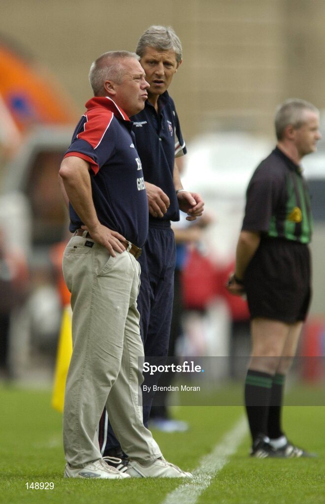 24 July 2004; Westmeath manager Paidi O'Se consults with selector Tomas O'Flatharta during the game. Bank of Ireland Leinster Senior Football Championship Final Replay, Westmeath v Laois, Croke Park, Dublin. Picture credit; Brendan Moran / SPORTSFILE