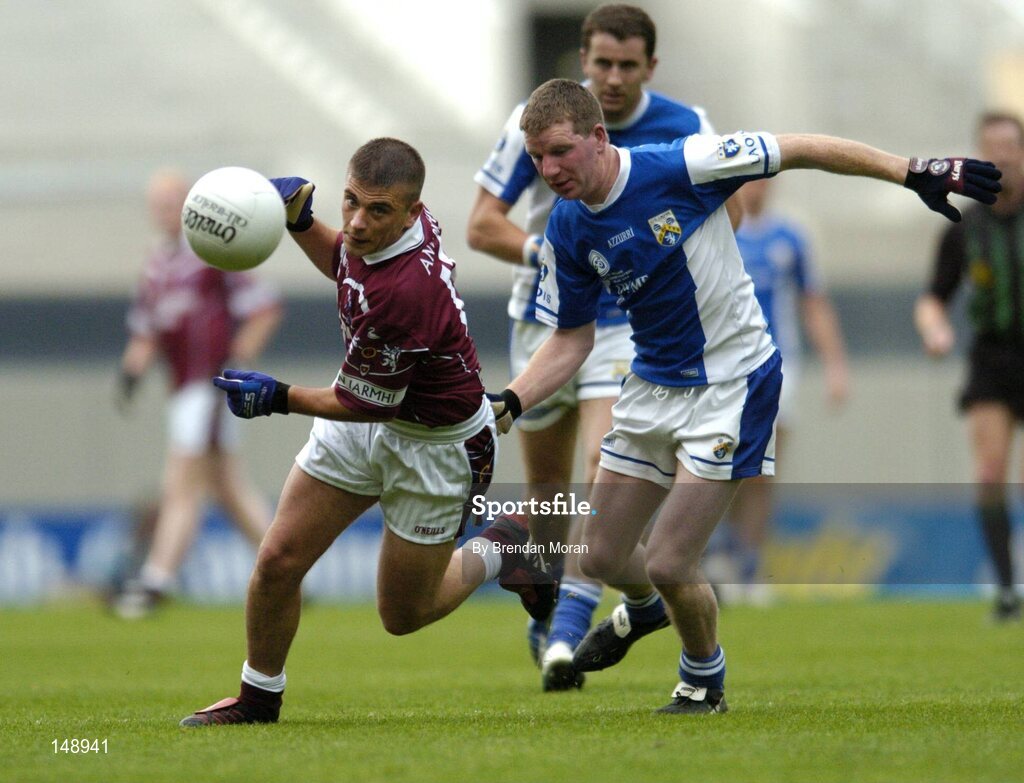 24 July 2004; Alan Mangan, Westmeath, in action against Paul McDonald, Laois. Bank of Ireland Leinster Senior Football Championship Final Replay, Westmeath v Laois, Croke Park, Dublin. Picture credit; Brendan Moran / SPORTSFILE